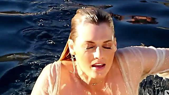 Brigitte Anne fondles her wet body on the poolside