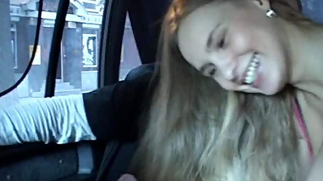 Naughty amateur girl gives a blowjob right in the taxi