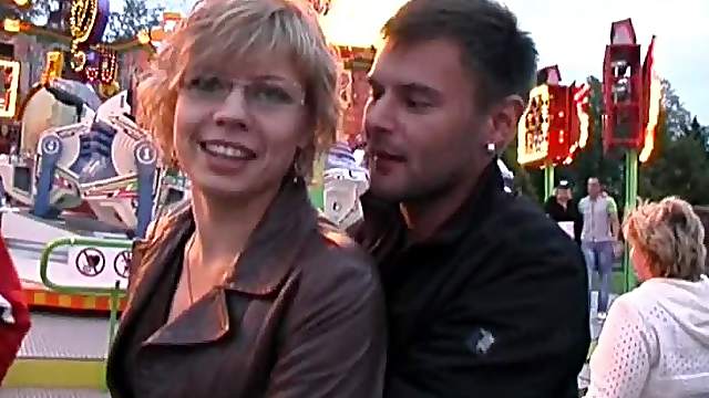 Slutty amateur babe gives a blowjob to her BF on a sofa
