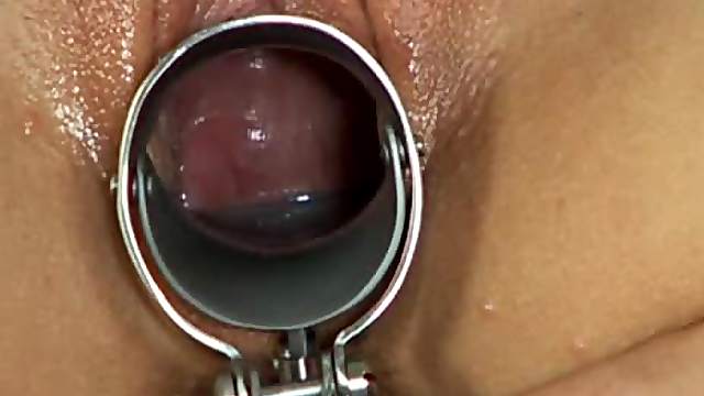 Slim and sexy Bambi toys her pussy and pisses in the kitchen
