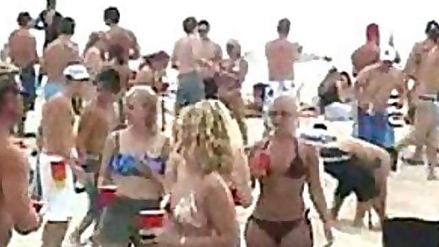 Horny Blonde MILF Gets Two Teen Cocks To Suck and Fuck On The Beach