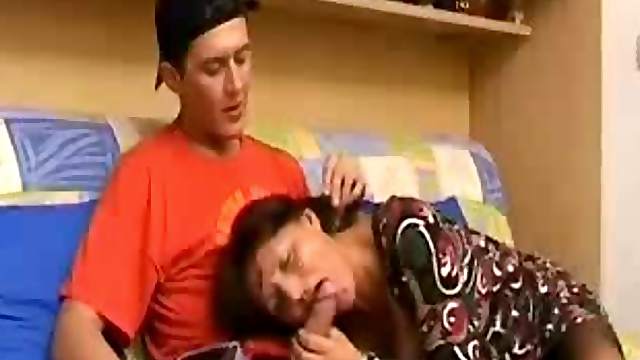 Mature brunette gives a handjob before getting amazingly fucked