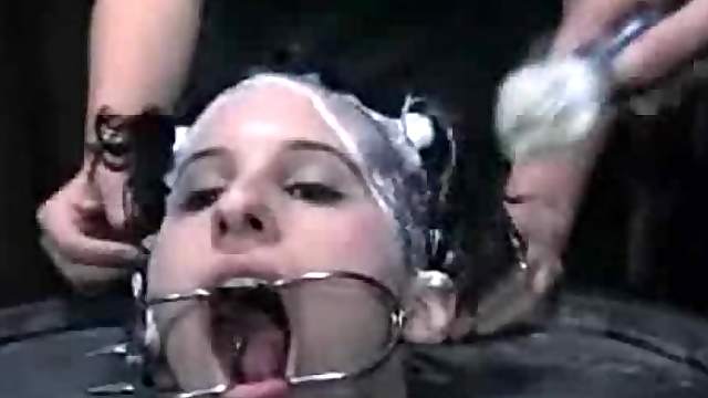 Bizarre and disgusting BDSM scene with a poor babe