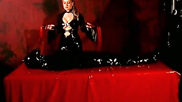 Latex Female Slave Teased By Dominatrix