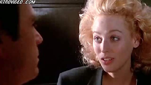 Blonde Babe Virginia Madsen Drinking Coffee and Showing Her Cleavage