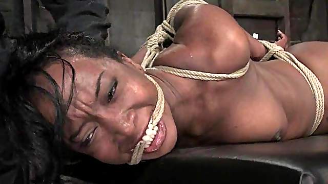 Luscious ebony slut gets tied up and tortured