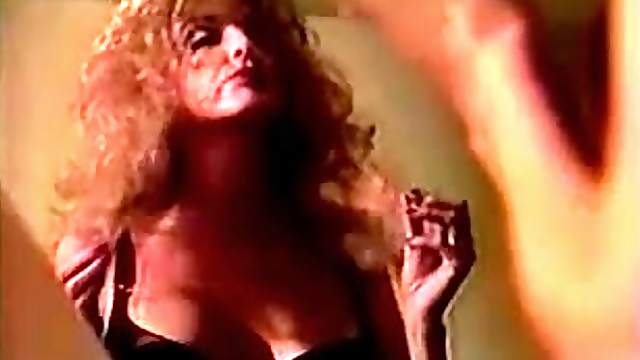 Retro video with curly MILF getting double penetrated