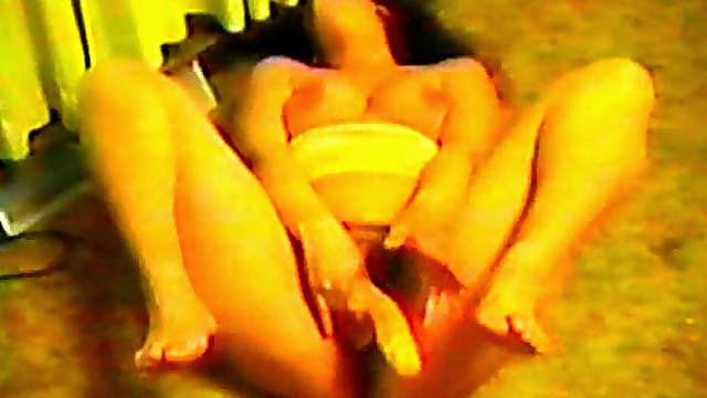 Salacious chubby brunette enjoys drilling her cunt with a dildo