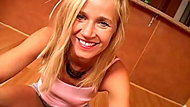 Blonde hottie demonstrates her handjob skills in POV clip
