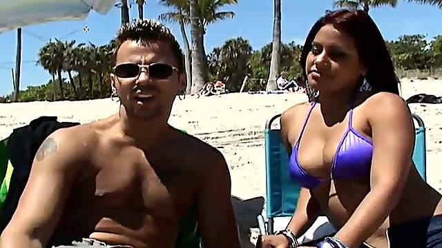 Spicy Latina wants to ride her man on the sands of a beach