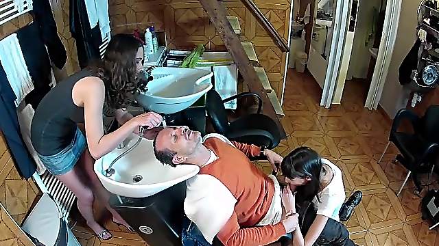 Yummy Brunettes Serve A Blowjob To A Guy While He Gets His Hair Done