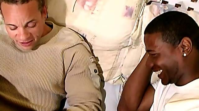 A tattooed guy gets his ass slammed in interracial gay threesome