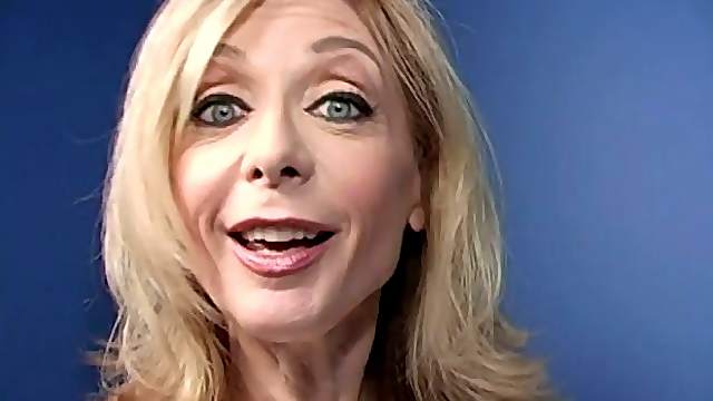 Mature blonde Nina Hartley gives BBC-sucking tutorial in gloryhole vid