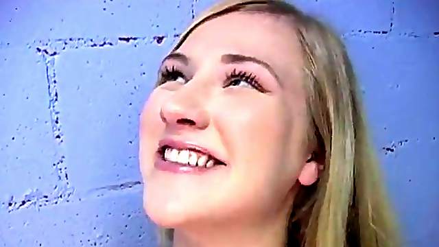 Pretty blonde shows her butt and sucks a gloryhole BBC