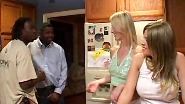 Two blond chicks are under a black penetration