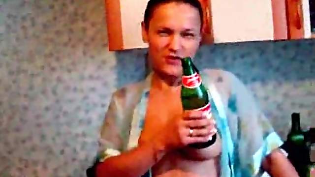 Amateur brunette shows her flabby tits in homemade clip