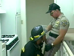 Hot fireman and a sexy gay cop blow each other