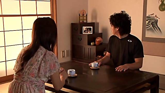 Mature Japanese hottie gives a passionate blowjob to a guy