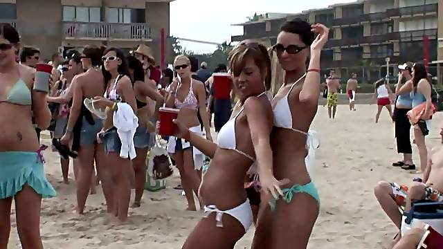 Some hot chicks show their nice bodies at a beach party