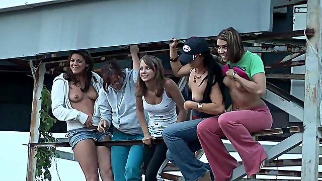 Randy teens on water ride enjoys stripping and displays ass and tits