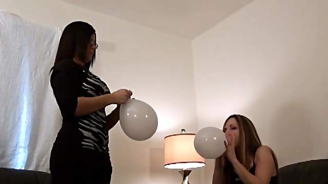 Cute Cougars have fun playing and bubbling balloons in a reality shoot