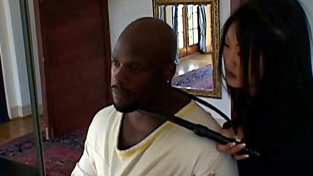 Asian babes gives black cock blowjob and share it in Femdom threesome action