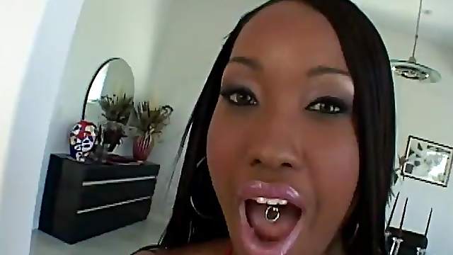 Ebony Porn star with pierced tongue gives massive cock blowjob