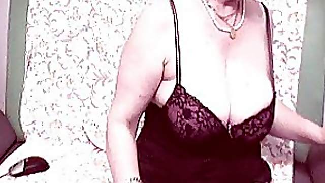 Lingerie Wearing Granny Shows Her Body If Front Of A Webcam