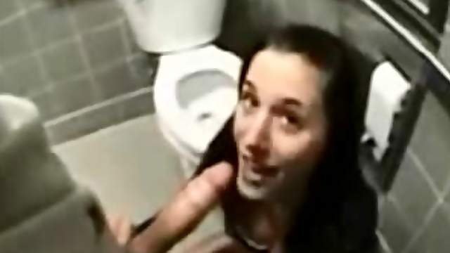 Brunette hussy enjoys ardent upskirt sex in a toilet