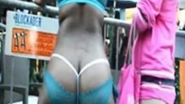 Girls with nice butts wearing bikinis get caught on a cam