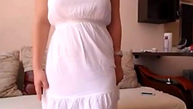Well-endowed chick flashes her privates for the cam