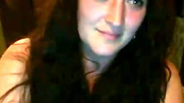 Obese brunette plays with her pussy in front of a webcam