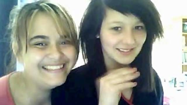 Two amateur chicks have fun in front of a webcamera