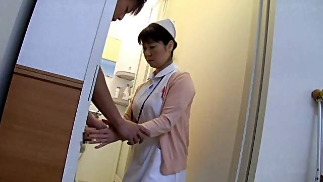 Mature Japanese nurse fucks a horny patient in a toilet