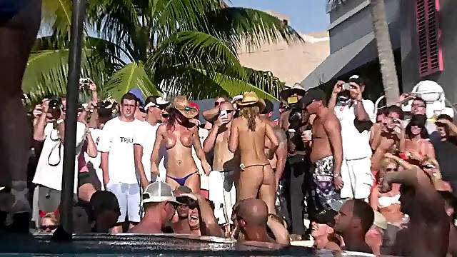 Topless chicks in thong party in the outdoor public fete