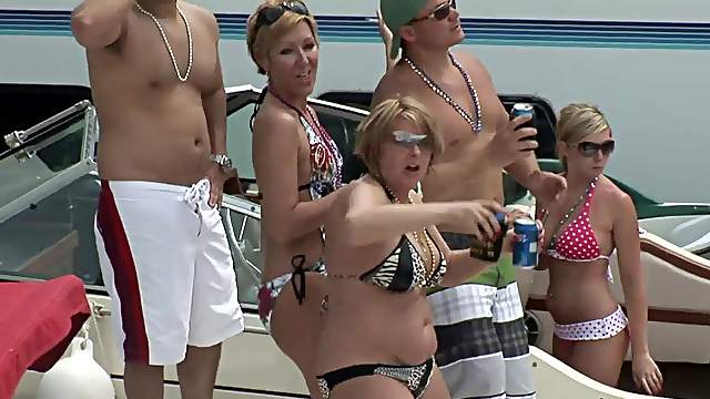 Babes on the yacht showing off pussy and ass in bikini