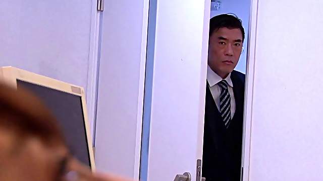 Attractive Japanese dame giving superb blowjob in the office in close up shoot