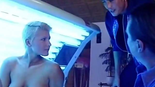 Busty blonde girlfriend sucks and fucks in a solarium
