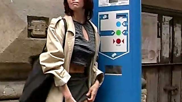 A young lady showing off her sweet pussy in the public and playing with it
