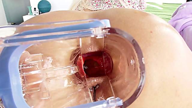 A blonde babe takes a speculum in the ass and a cock in her pussy