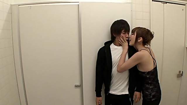 Cock thirsty MILF milks a strangers cock in a public toilet