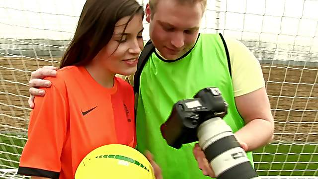 A hot soccer girl gets naked and gets banged by a photographer