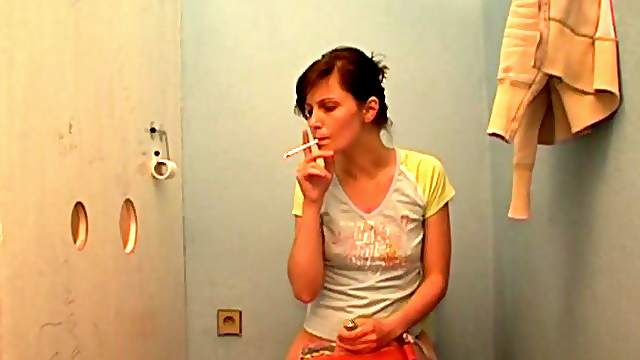 Horny babe sucks a gloryhole dick then drives it up her twat