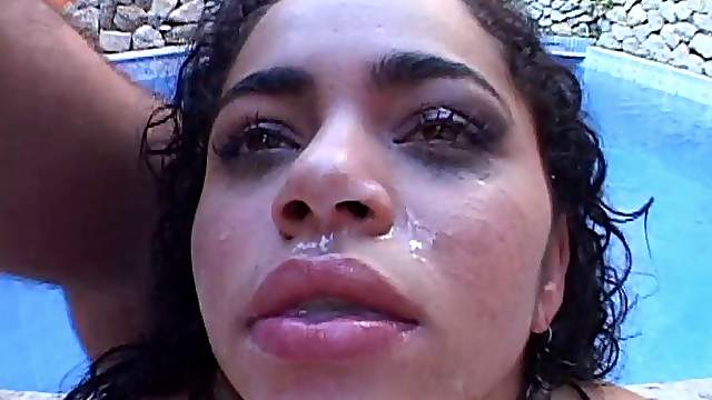 Wavy haired pornstar gets a creampie facial after being gang banged