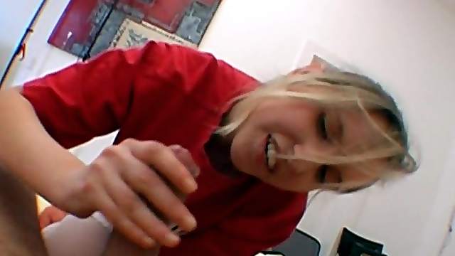 Jeans-clad blonde with a stunning body sucking a stranger's cock