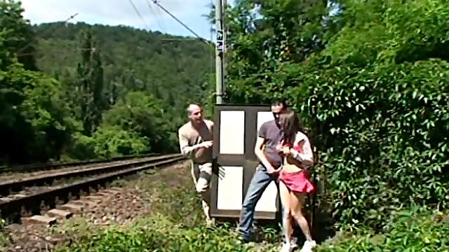 Can she handle two cocks in an outdoors railway station sex