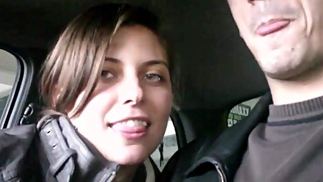Kinky babe with long dark hair sucking a stranger's cock in his car