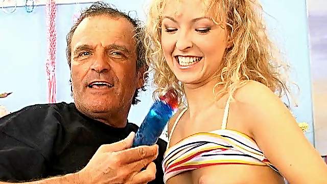 Wavy haired blonde squirms as her anal engulfs a thick boner
