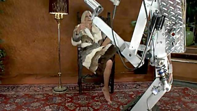 Busty Blonde MILF Fucked By a Human-Shaped Machine