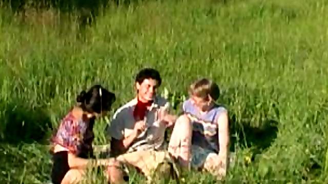 Mature ladies utterly devour his dick in a grassy field